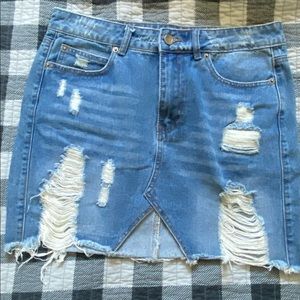 Distressed jean mini skirt